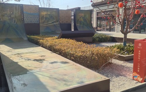 澳海南棠印售楼部门前的卷轴景观